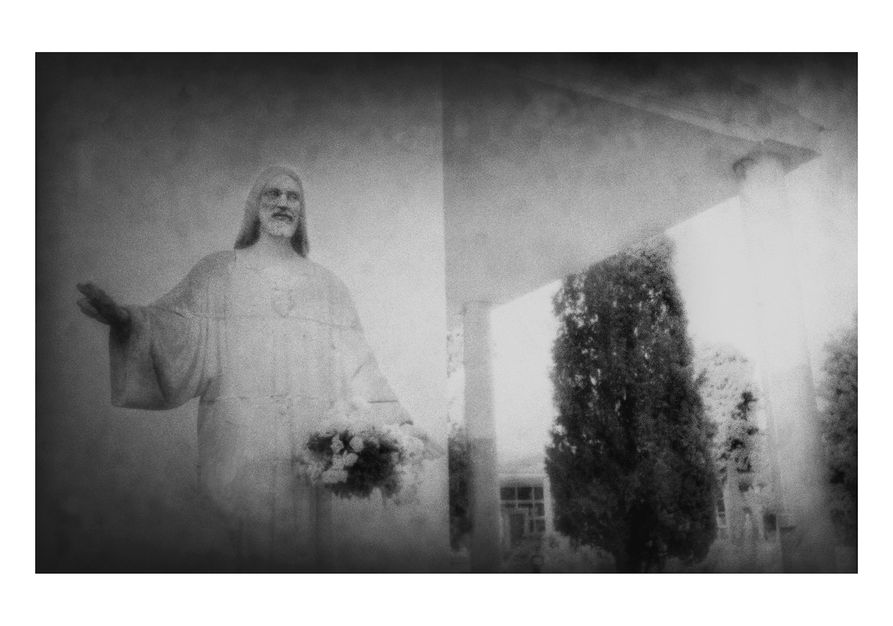 The Statue of the Christ in a cemetery after Los Monegros Desert