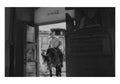 A cowboy enters a bar riding his horse in Ponte de Lima